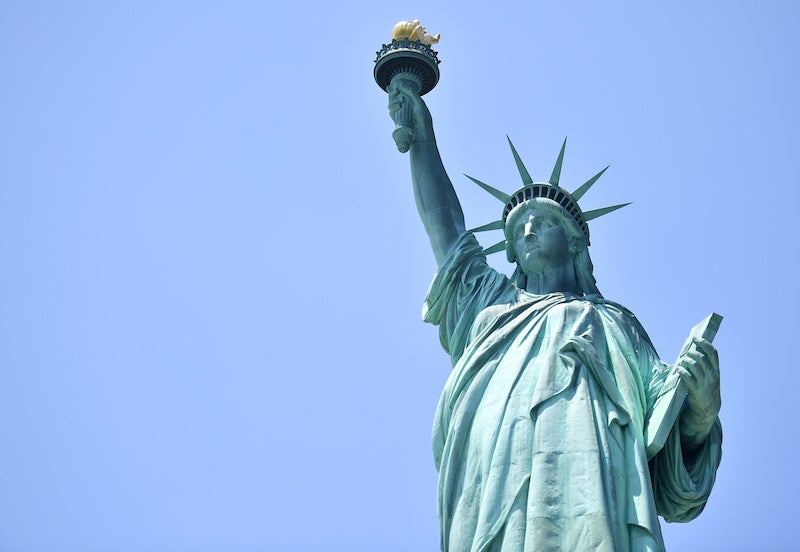 Black Woman Arrested After Climbing The Statue of Liberty In Protest 
