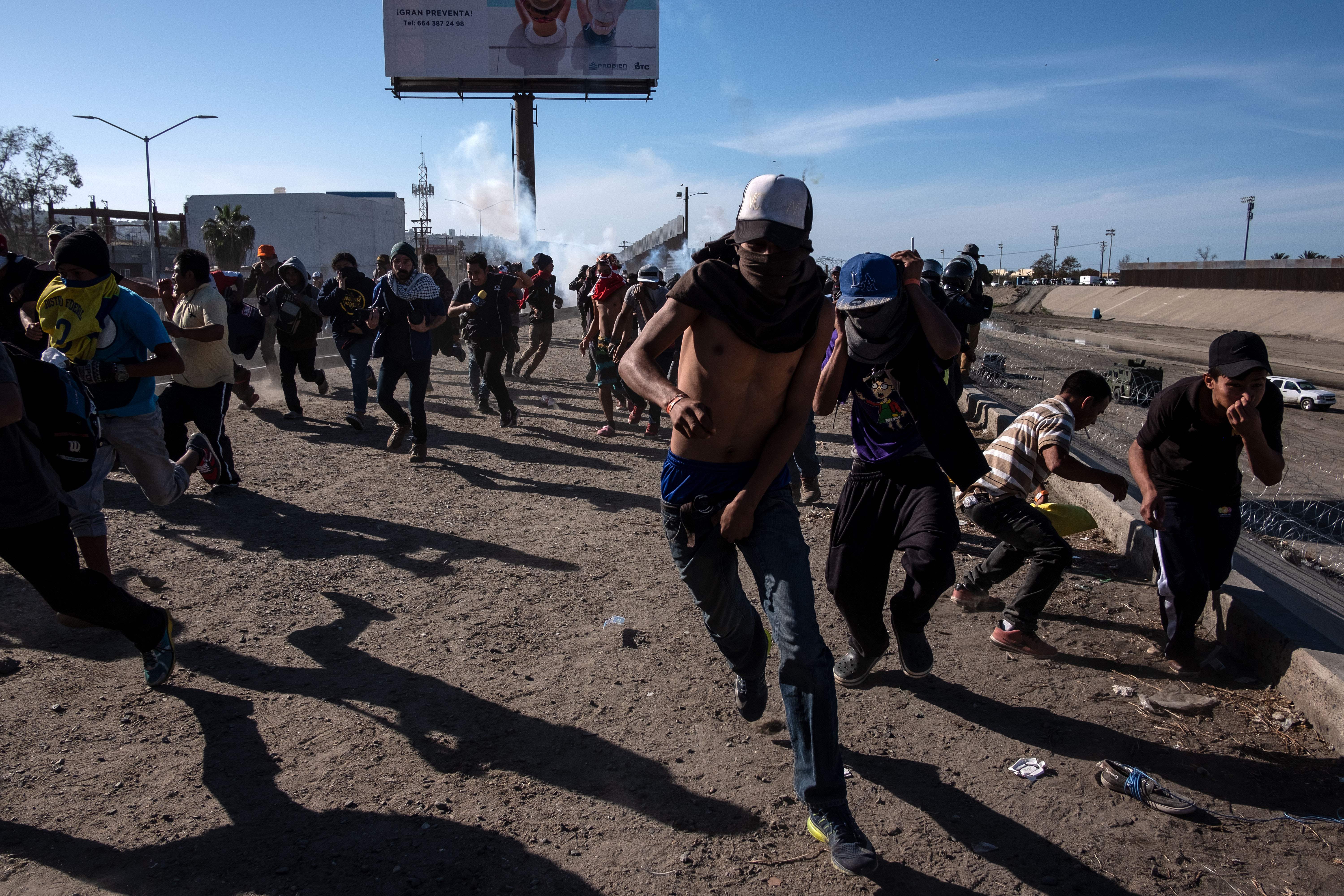 US Authorities Deploy Tear Gas At Migrants Near San Ysidro Port Of Entry