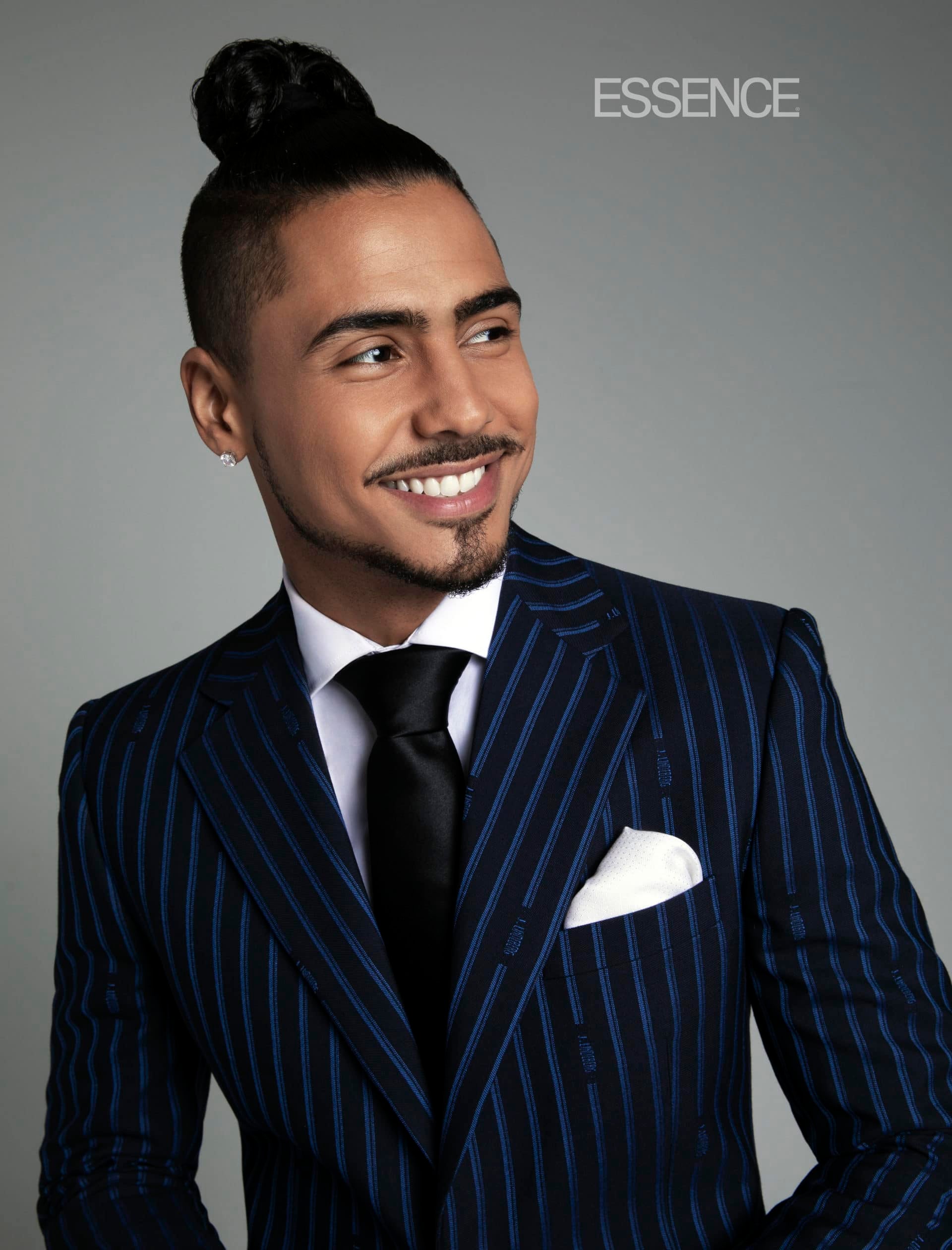 EXCLUSIVE: Quincy Brown Talks New Film, Music And Rocking Fly Holiday Suiting!