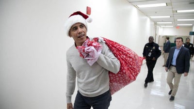 Barack Obama Visits D.C. Children’s Hospital In Santa Cap