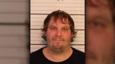 Tennessee Man Arrested After Yelling Racial Slurs, Pointing Gun All While Trying to Run Over Children