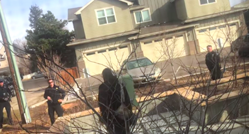 Black Man Picking Up Trash In Front Of His Own House Confronted By Cops With Guns Drawn