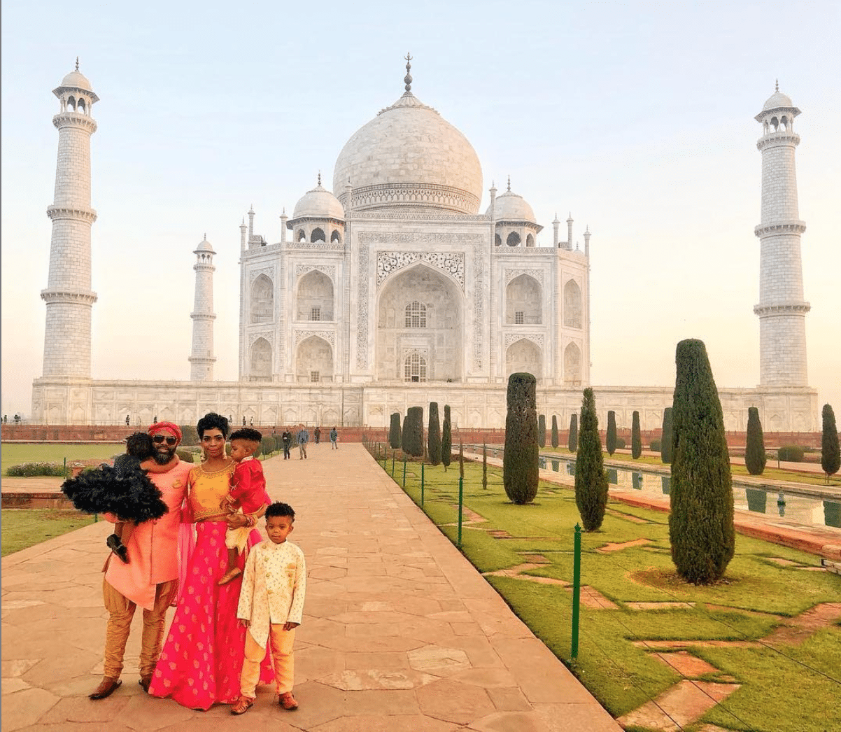Black Travel Moment of the Day: We Love This Sweet Family Photo Opp At The Taj Mahal