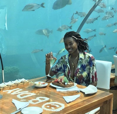 15 Black Women Enjoying Unique Food Adventures Around The World