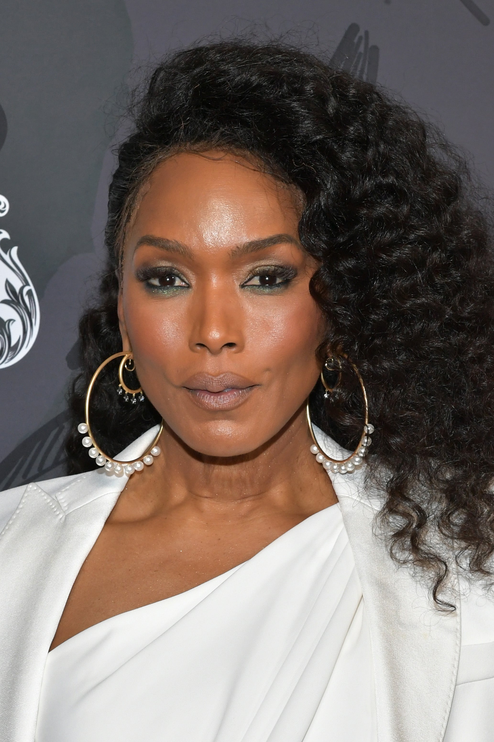 13 Times Angela Bassett Reminded Us Why She's Muva To This Beauty Game