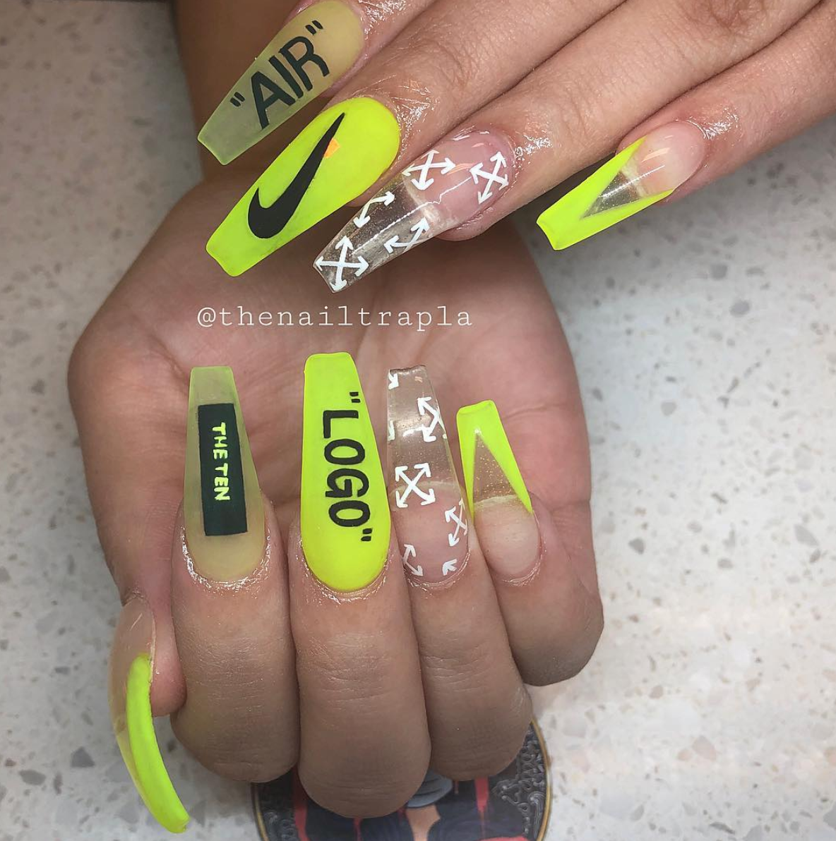 9 Reasons To Get Into Logo Nails This Spring