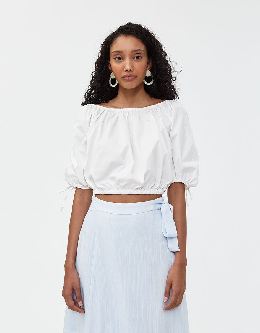 These White Statement Tops Deserve A Round Of Applause