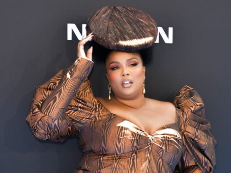 Lizzo Opted For Wood Grain And Natural Hair For Her BET Awards Look