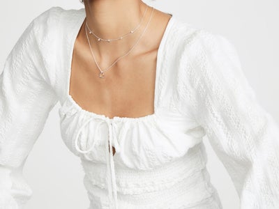 These White Statement Tops Deserve A Round Of Applause