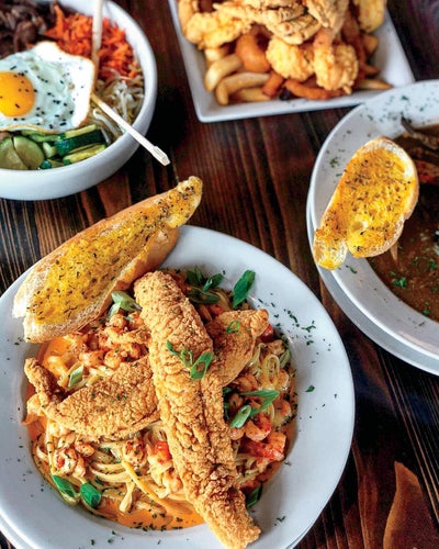 ESSENCE Eats: Explore The Flavors Of New Orleans At These Black-Owned Hot Spots