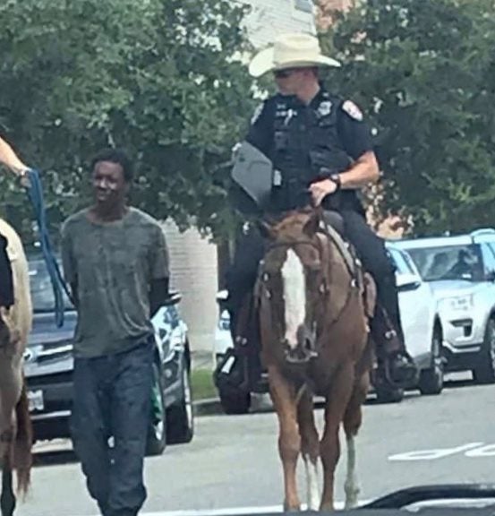 Texas Police Blasted After Mounted Officers Pictured Leading Black Man By Leash