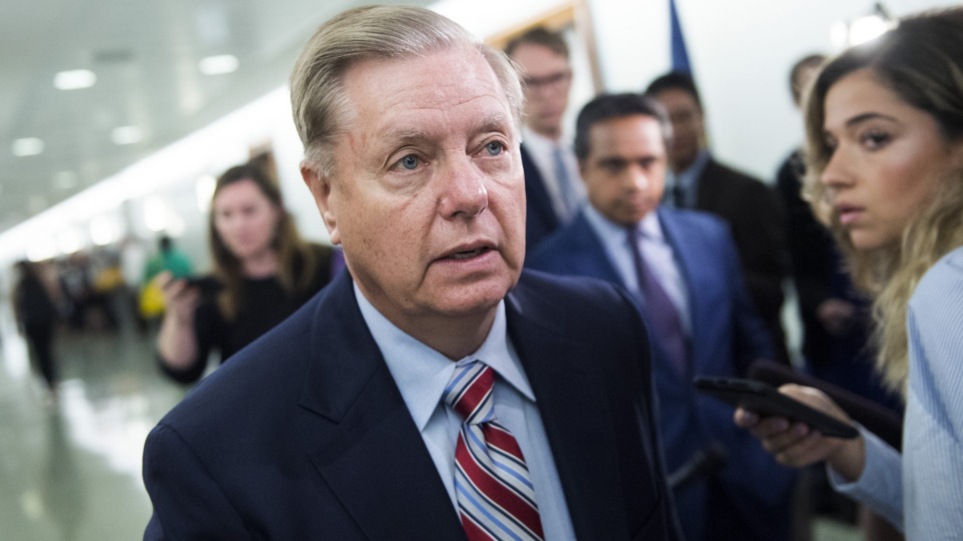Protesters Call Lindsey Graham A 'Hypocrite' Over SCOTUS Decision