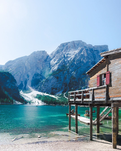 Black Travel Vibes: Explore Majestic Lakes And Mountains in Italy