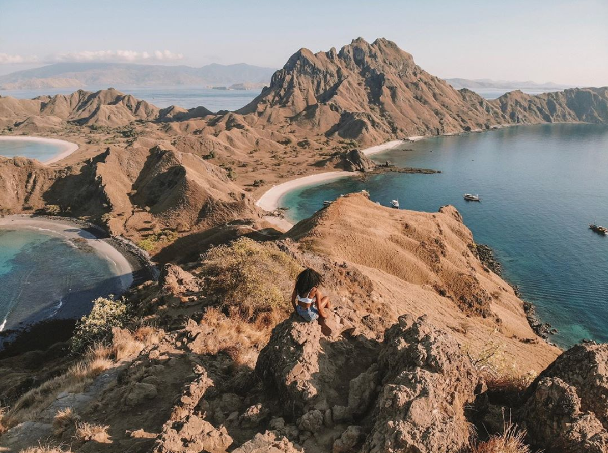 Black Travel Vibes: Relax On The Colorful Shores Of Komodo Island