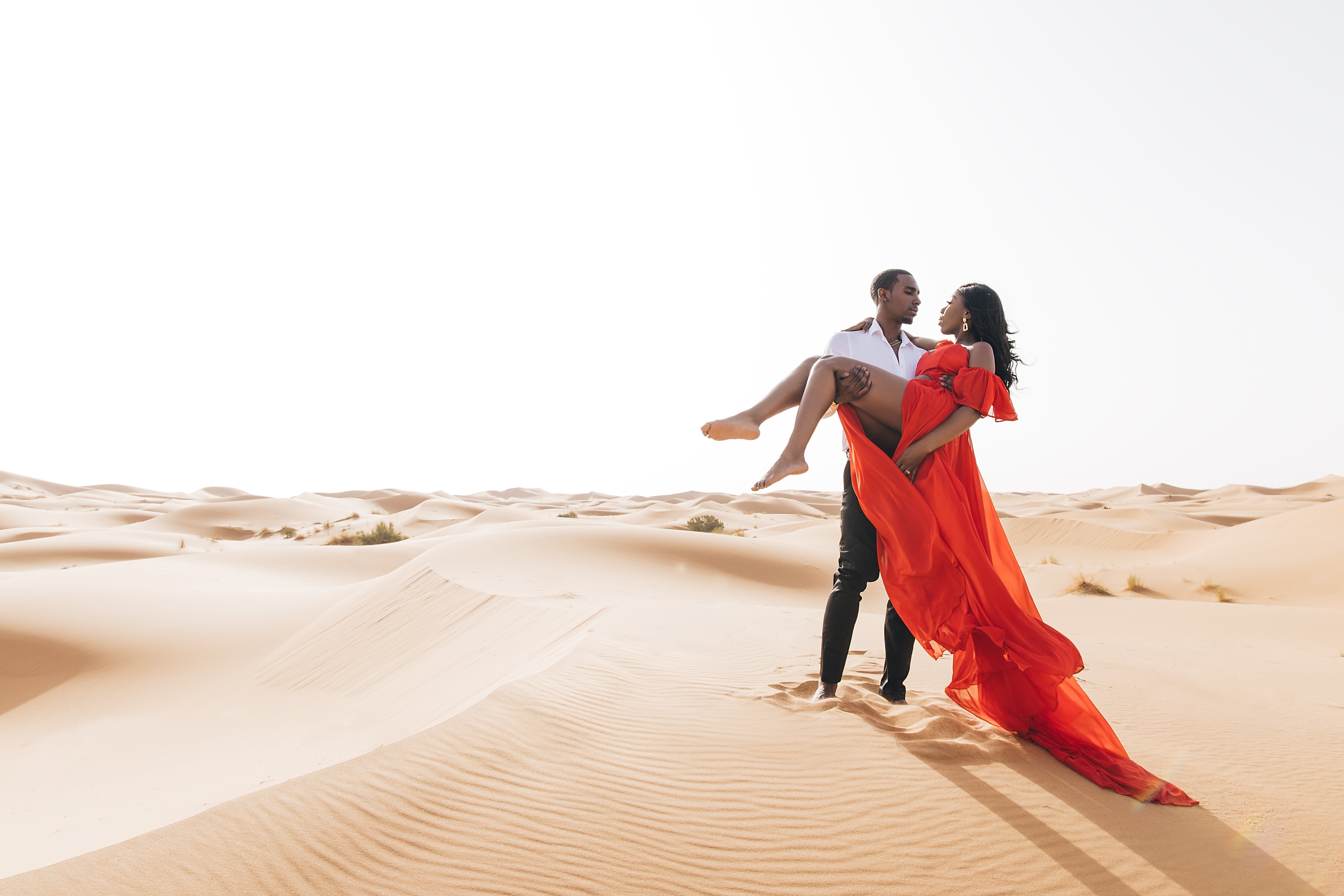 Black Wedding Moment Of The Day: We're Amazed At YouTubers Essie & Maurice's Desert Engagement Shoot