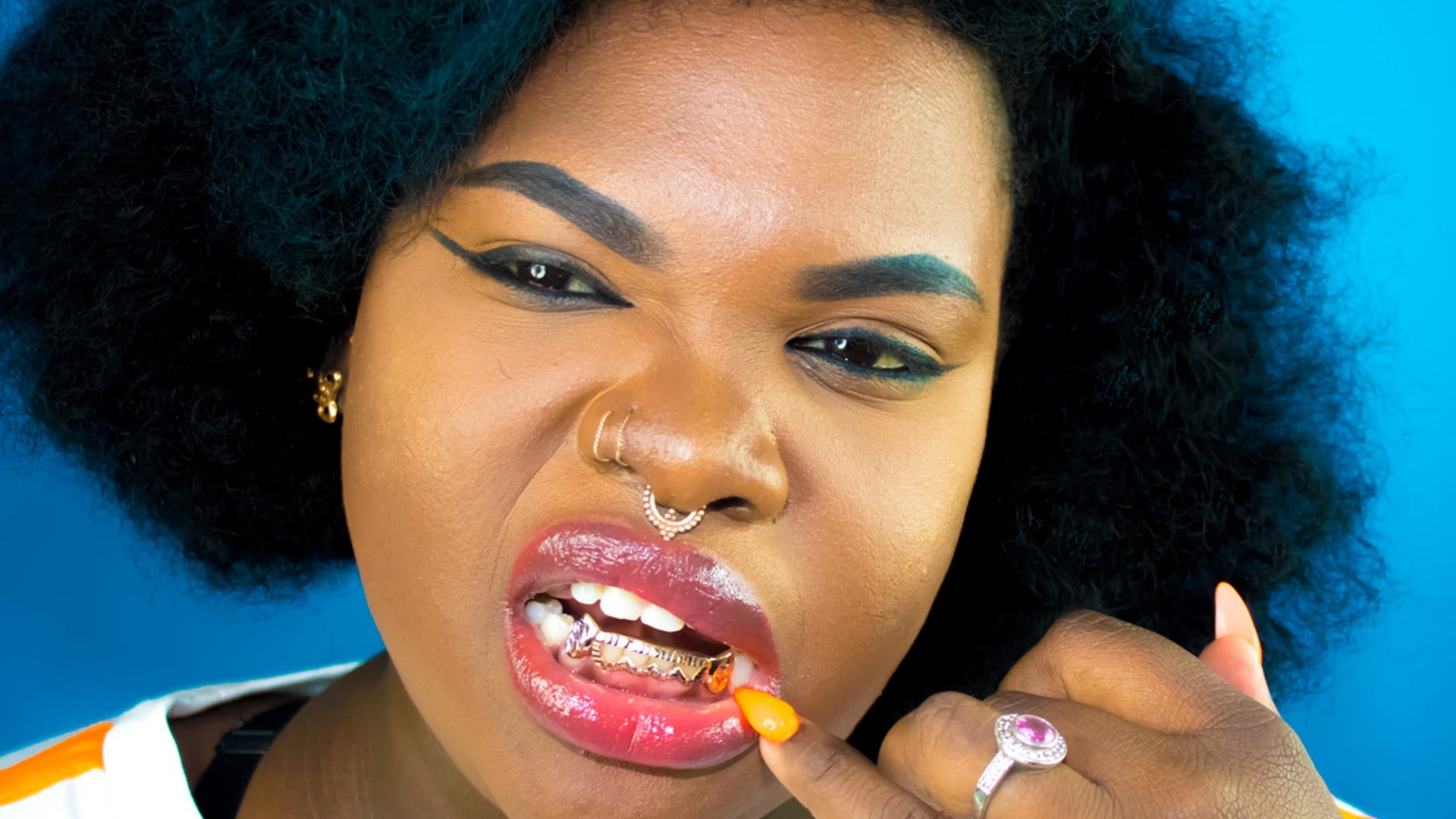 These 15 Beauties In Grillz Make Us Want To Get Some Tooth Bling