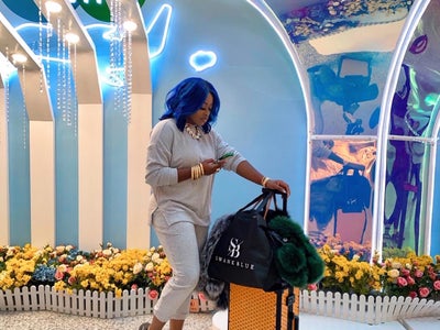 Stylist Olori Swank Dishes On What’s In Her Carry-On Bag