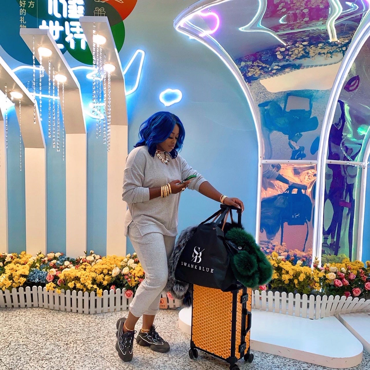 Stylist Olori Swank Dishes On What’s In Her Carry-On Bag