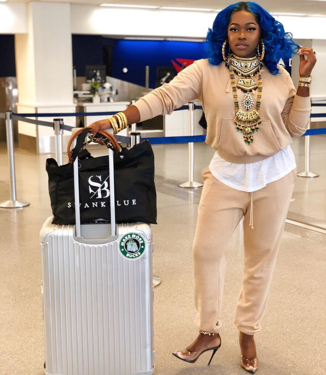 Stylist Olori Swank Dishes On What’s In Her Carry-On Bag