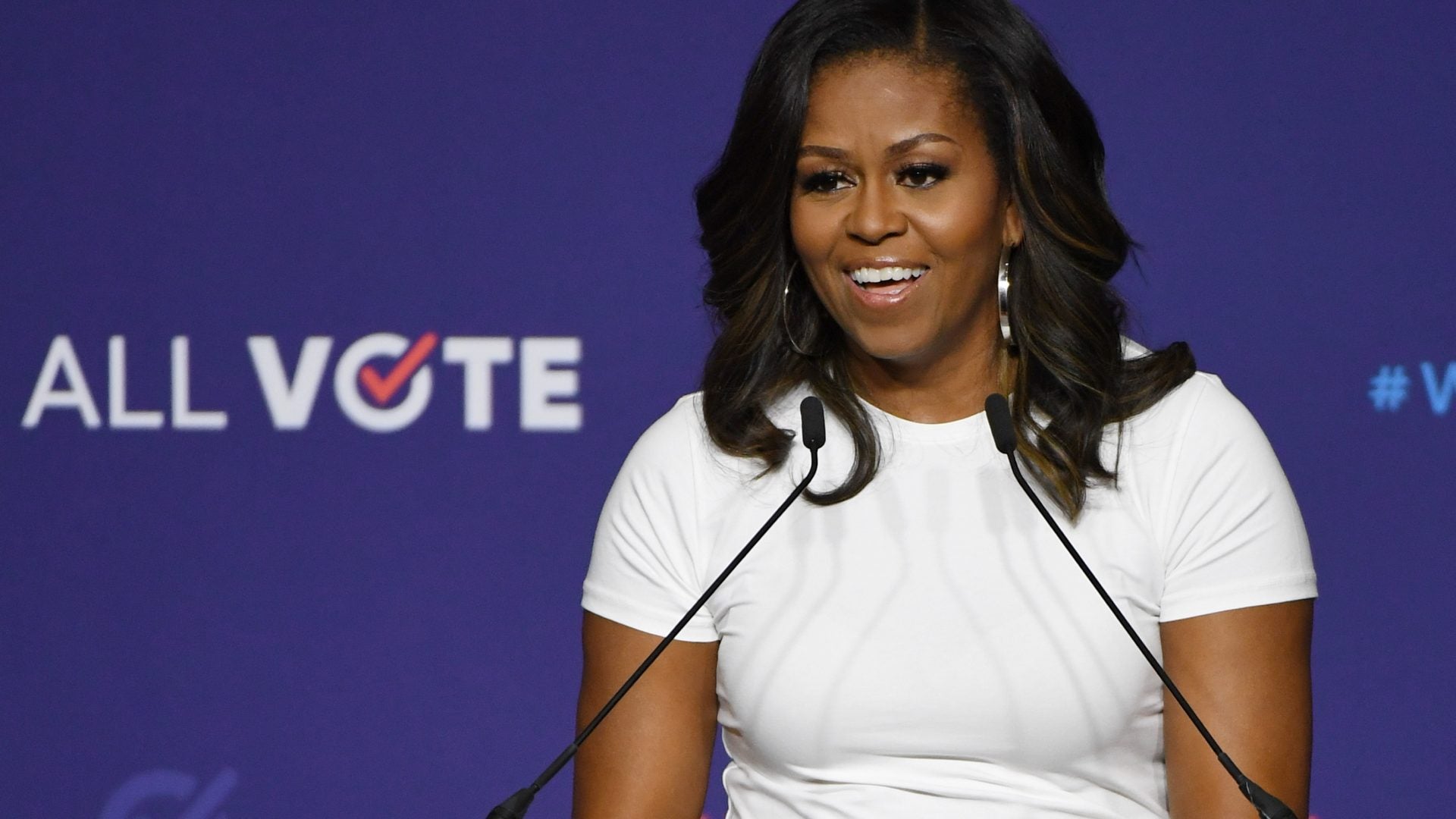 Michelle Obama Posts ’80s Prom Photo To Promote Voting Among High School Seniors
