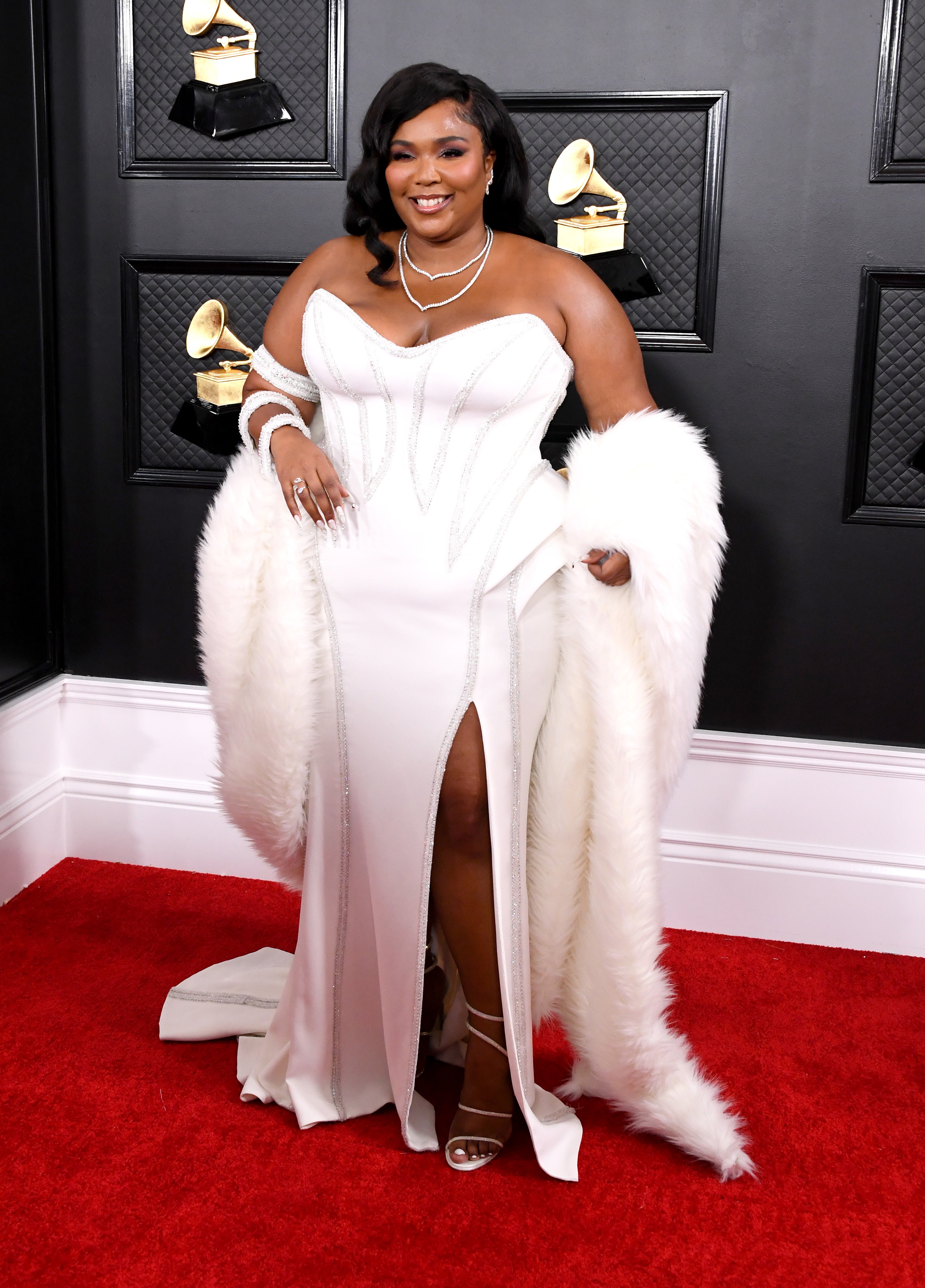 Lizzo Sports Sleek Versace Gown On The Grammy's Red Carpet