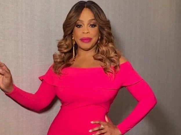 Niecy Nash's Hot Pink Dress Is The Perfect Pop Of Color This Season