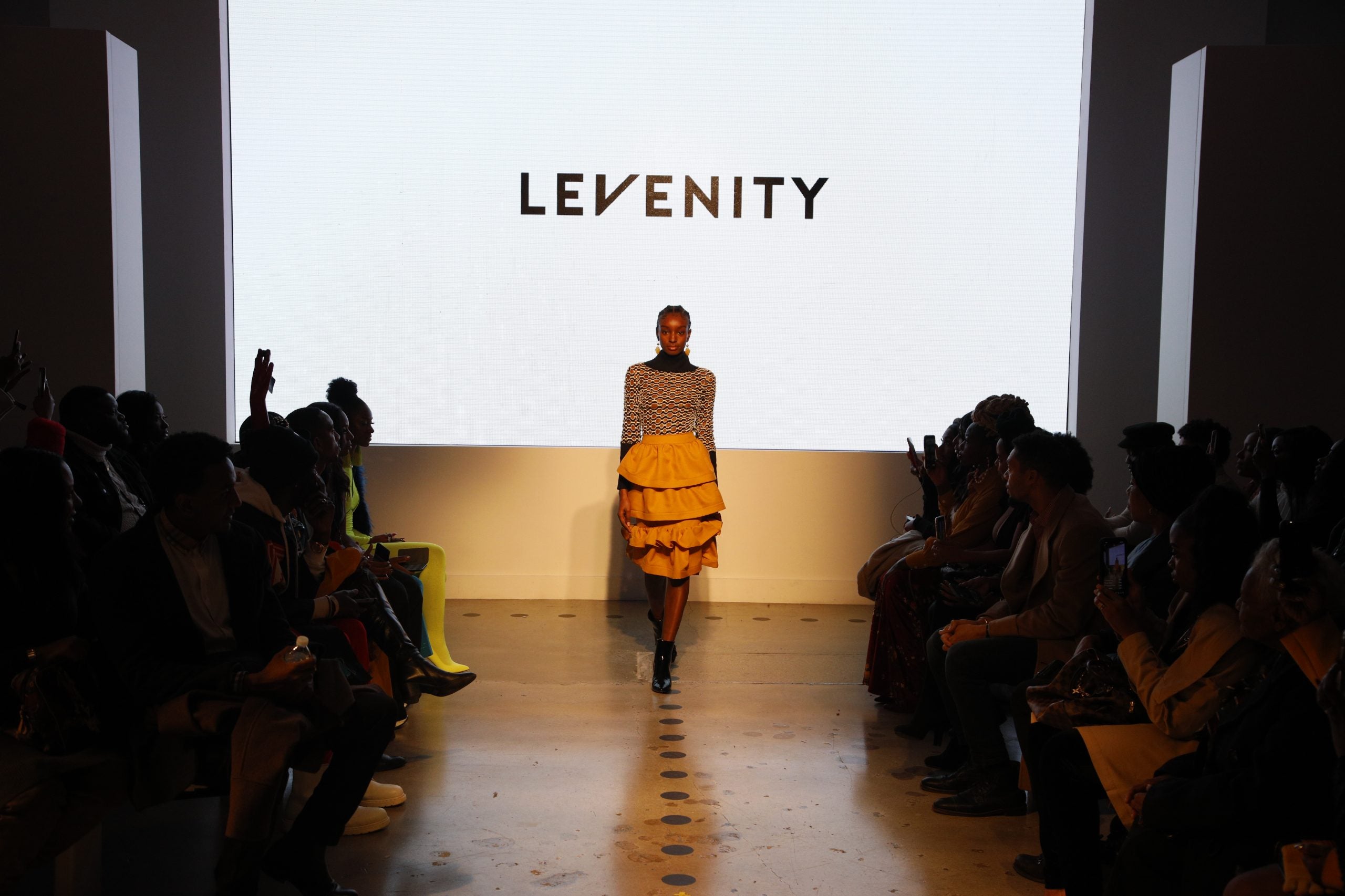 Designer Venny Etienne of LEVENITY Presents A Vibrant Collection At ESSENCE Fashion House