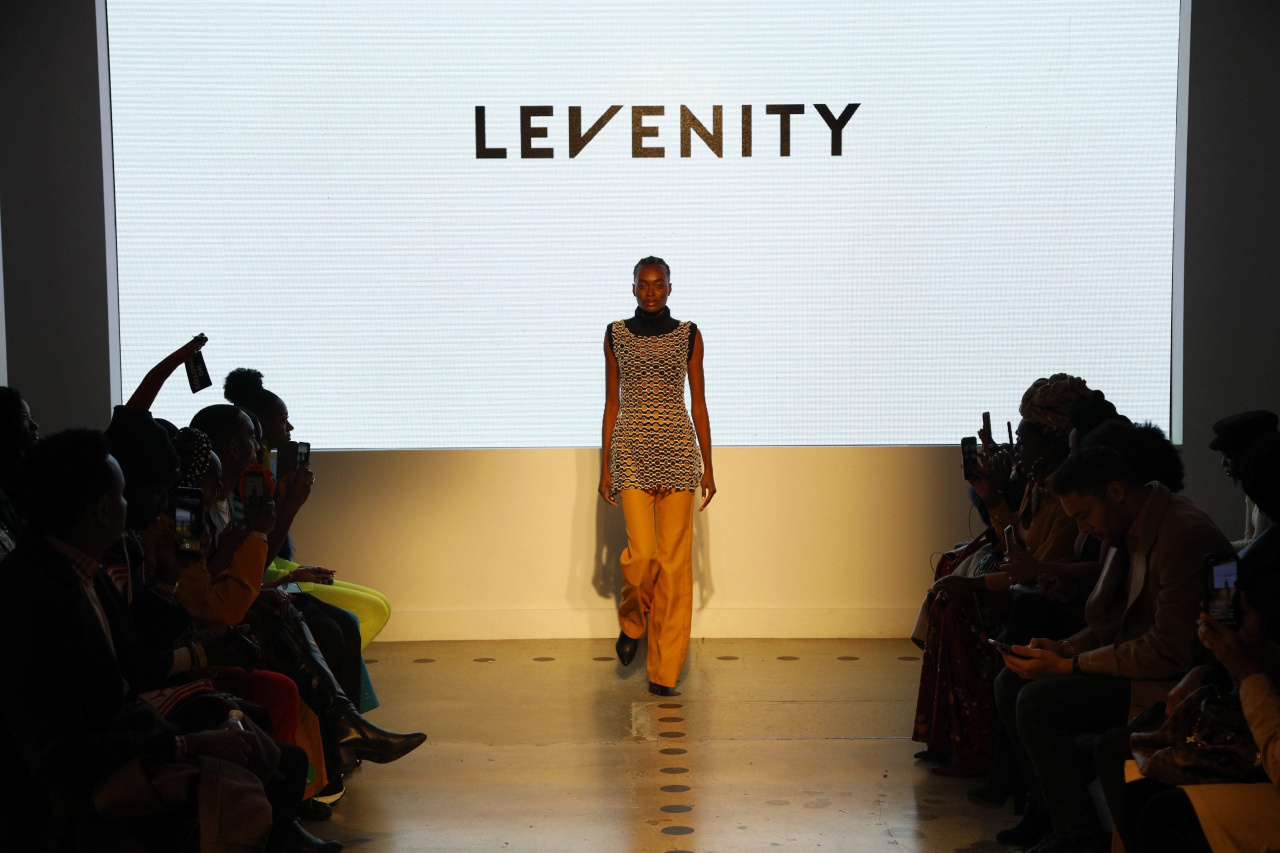 Designer Venny Etienne of LEVENITY Presents A Vibrant Collection At ESSENCE Fashion House