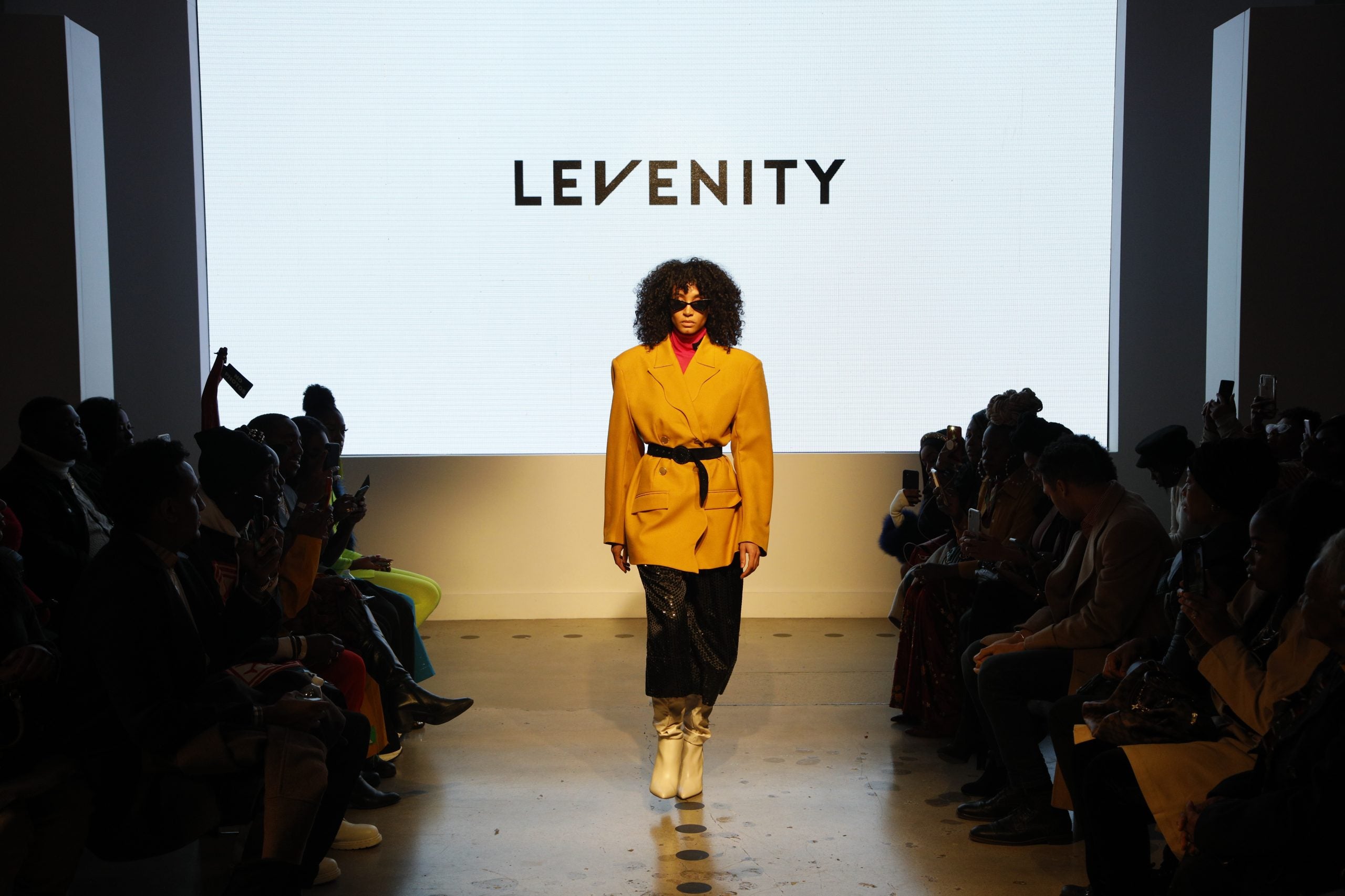 Designer Venny Etienne of LEVENITY Presents A Vibrant Collection At ESSENCE Fashion House