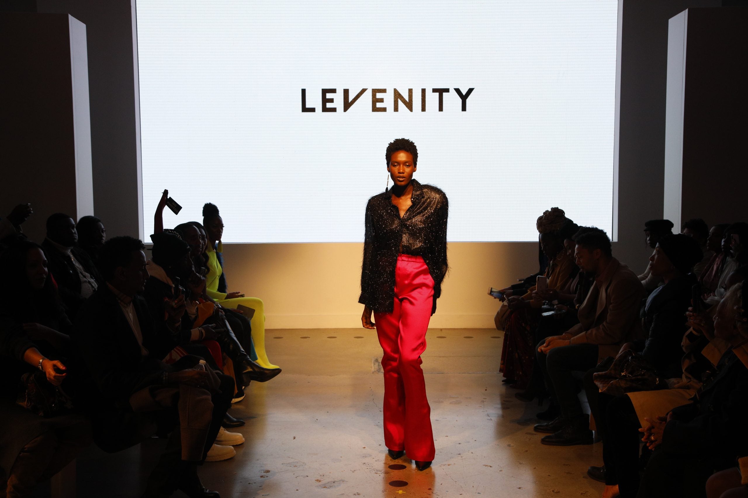Designer Venny Etienne of LEVENITY Presents A Vibrant Collection At ESSENCE Fashion House