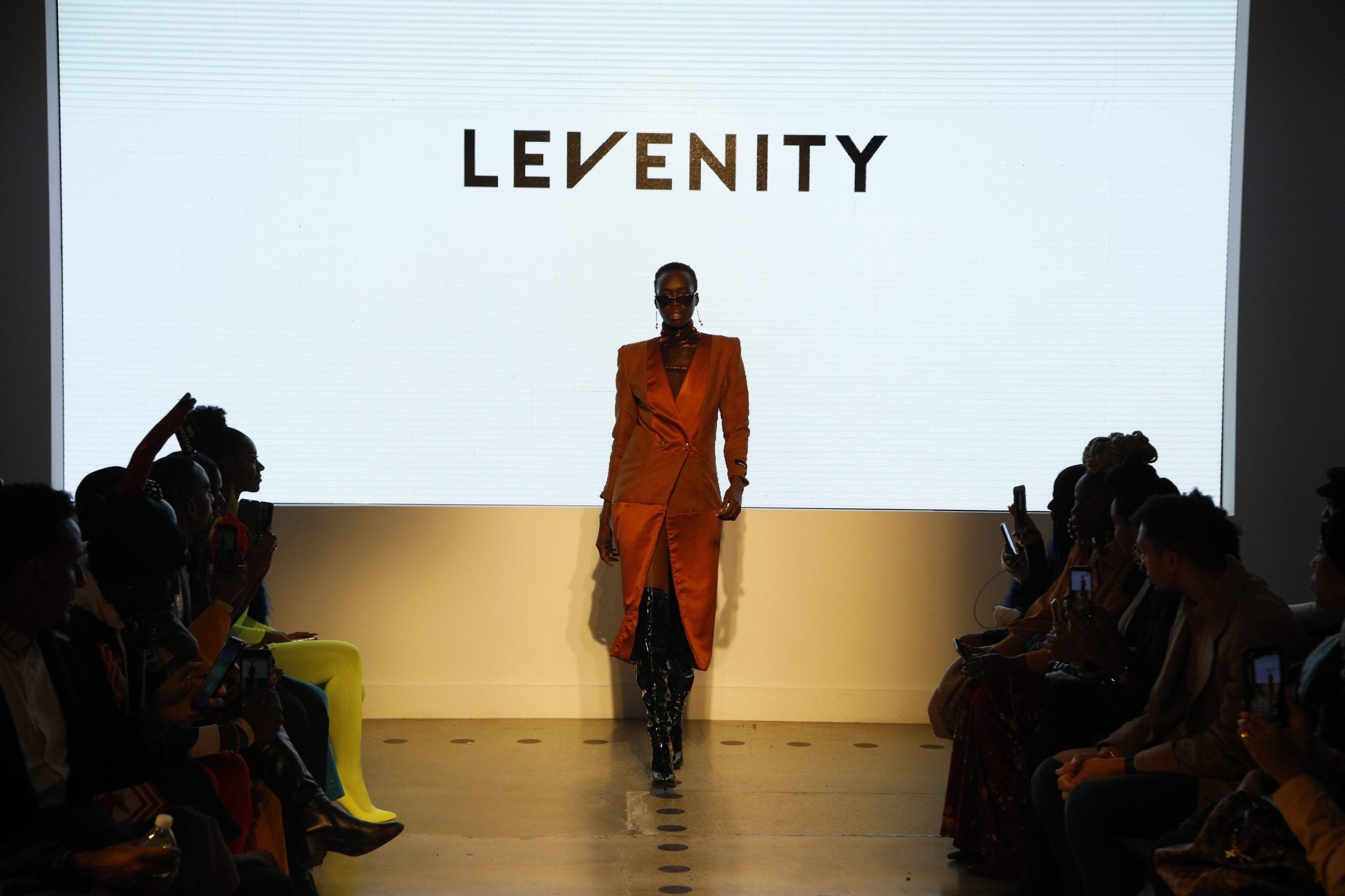 Designer Venny Etienne of LEVENITY Presents A Vibrant Collection At ESSENCE Fashion House