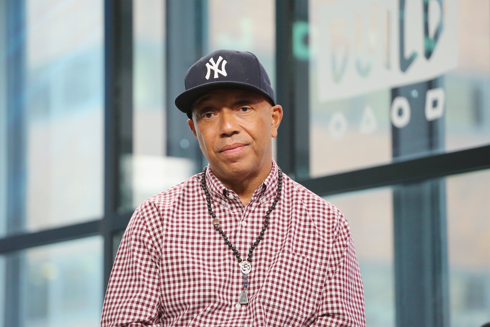 Tidal And Revolt Slammed For Russell Simmons 'Drink Champs' Appearance