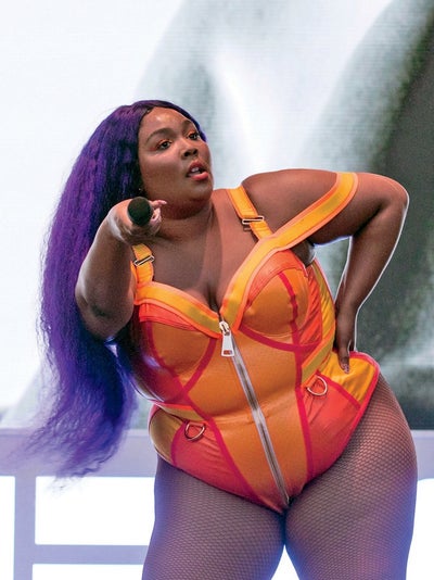 Lizzo Claps Back At Her Body-Shamers In A New Workout Video