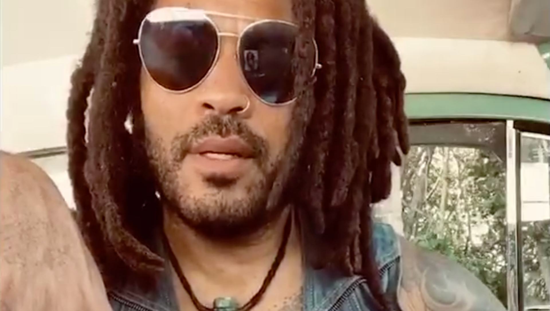 Watching This Sexy Video Of Lenny Kravitz Announcing His New Book Is The Best Thing You'll See All Day