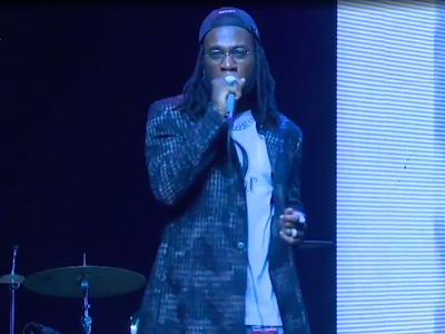 Burna Boy Performs “Collateral Damage” From African Giant