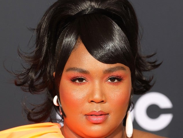 We Can't Get Enough Of Lizzo's Money Green Hairdo