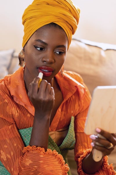 This Black Content Creator Made A Red Lipstick That’s Wearable For All Skin Tones