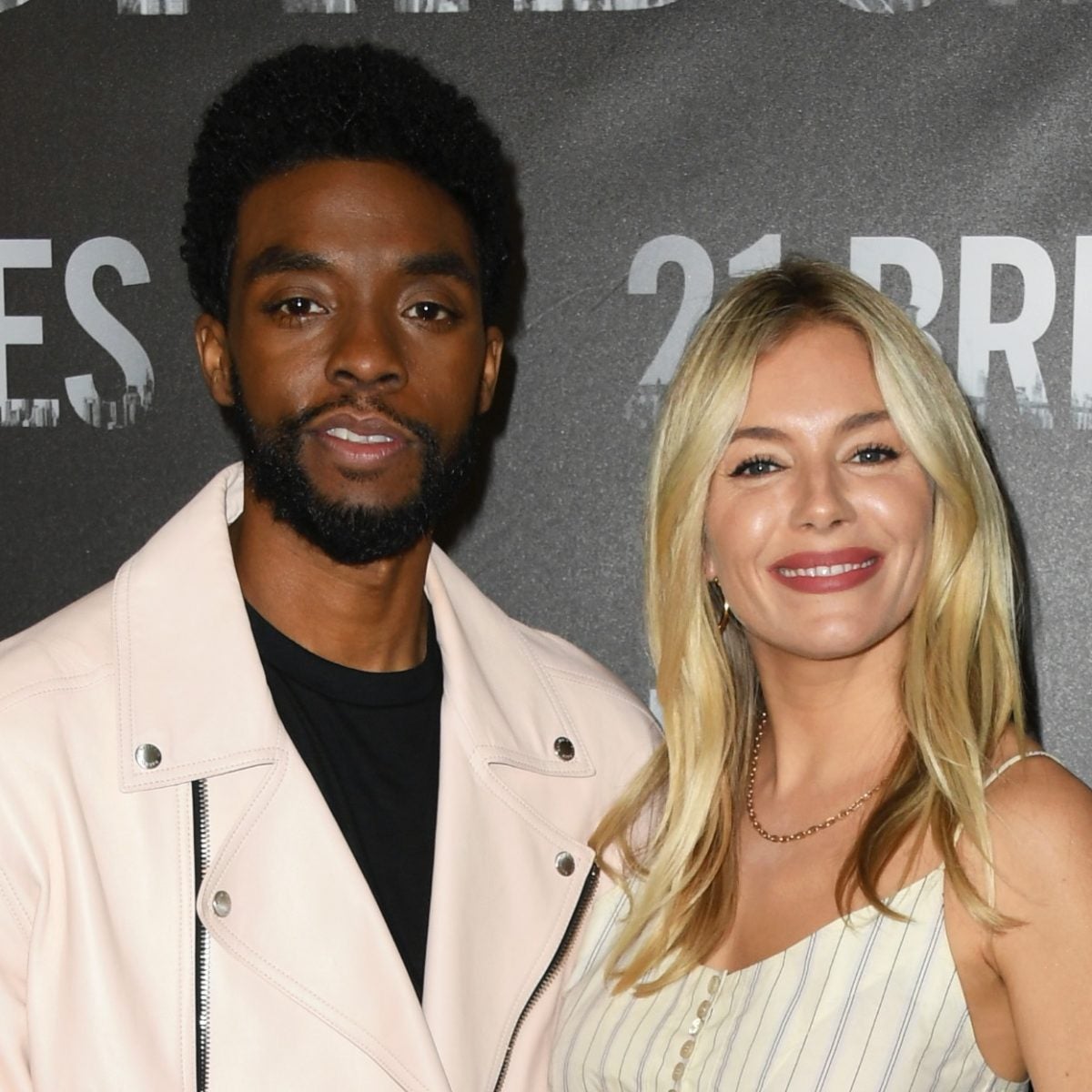 Chadwick Boseman Took A Pay Cut To Get ‘21 Bridges’ Costar Sienna Miller Paid Her Worth