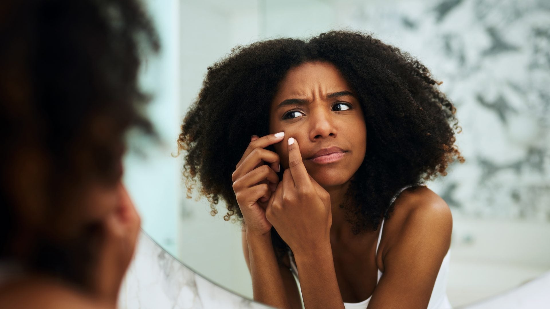 A Black Dermatologist Explains How To Clear Up Those Stubborn Dark Spots