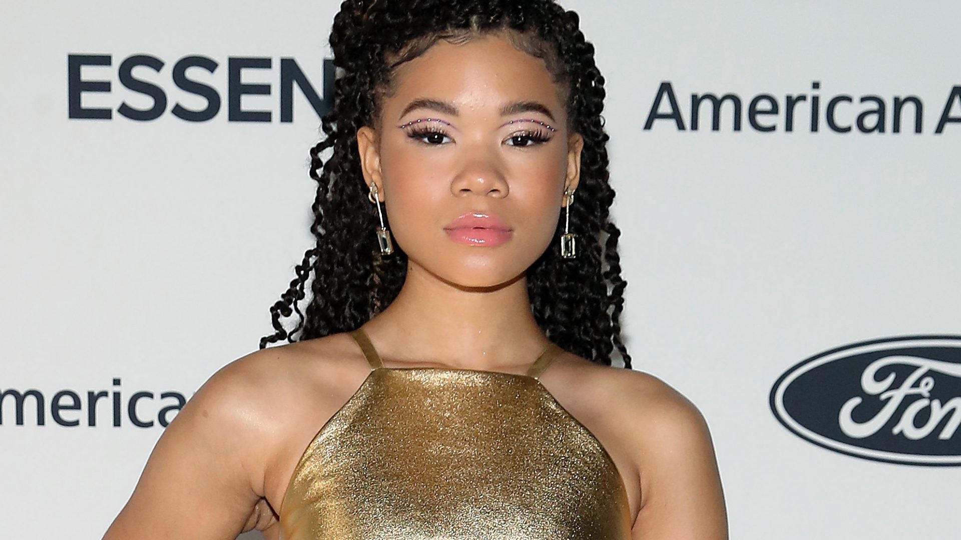 Storm Reid Was A Golden Goddess In This Custom Prada Look On The ESSENCE Red Carpet