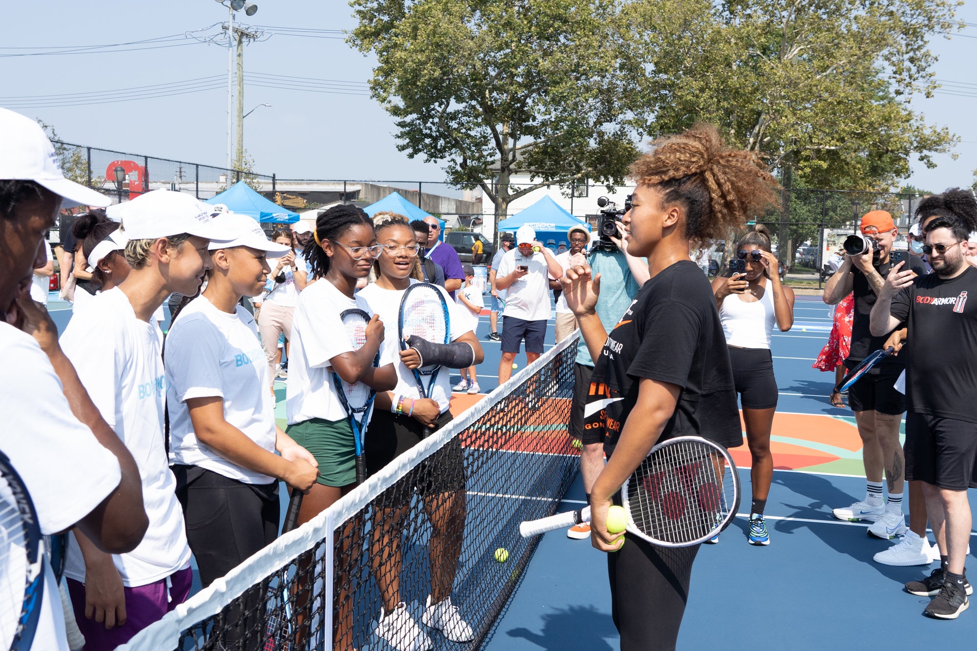 Naomi Osaka Returns To Restored Courts Where She Got Her Start To Play With Next Generation Of Tennis Stars