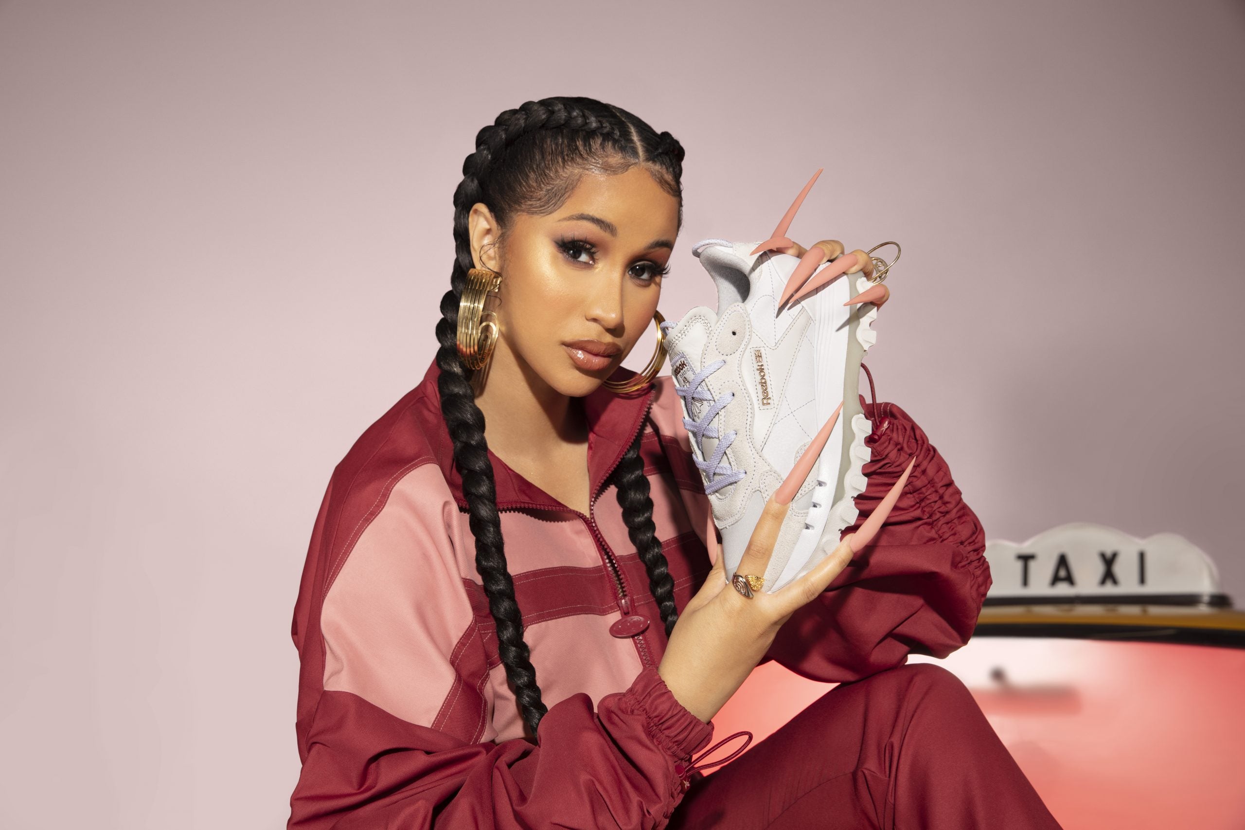 Cardi B Celebrates New Reebok Collection By Giving Back To The Kids At Her Childhood Elementary School