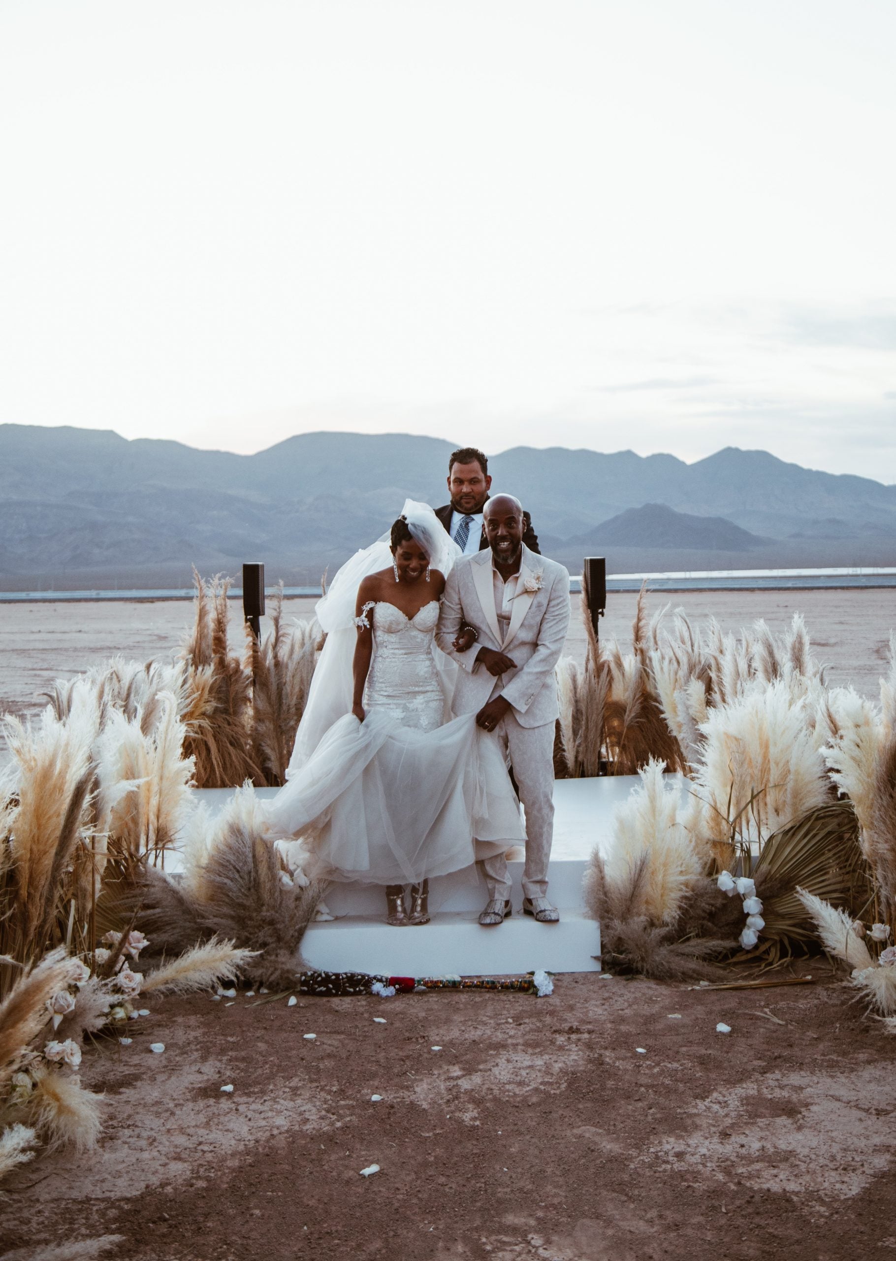 Bridal Bliss: Riqua And Andre's Las Vegas Wedding Included Showgirls, The Strip, And A Stunning Desert Ceremony