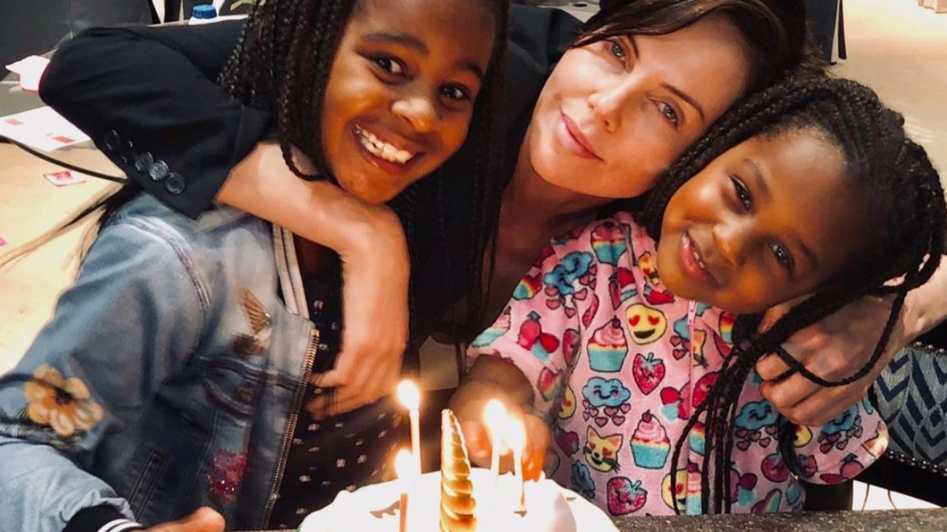 Charlize Theron Says Black Women in Her Life "Put Her in Place" when it comes to Raising Black Daughters