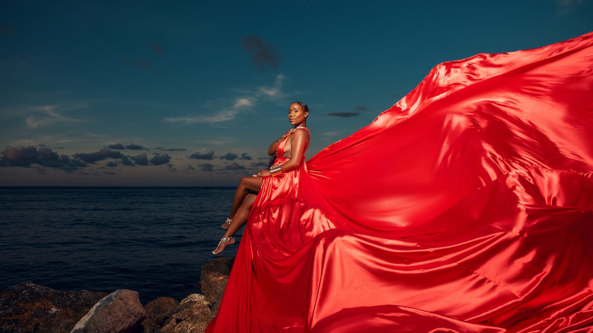 Move Over Greece! This Black Woman Created The ‘Flying Dress’ Experience In Jamaica