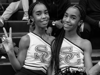 The Combs Twins Show Off Their Cheerleading Chops In Front Of Their Famous Father