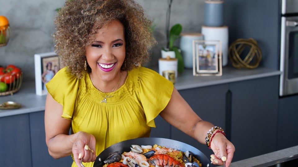 How Afro-Latina Chef and TV Host Bren Herrera Mastered Betting On Herself and Spreading Love Through Food