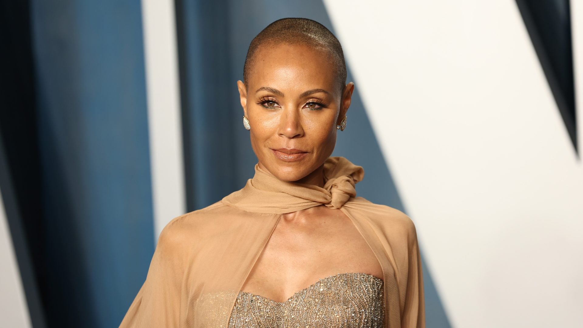 'Unfortunate' Comment About Jada Pinkett Smith's Shaved Head Sparks Necessary Conversation About Alopecia Areata