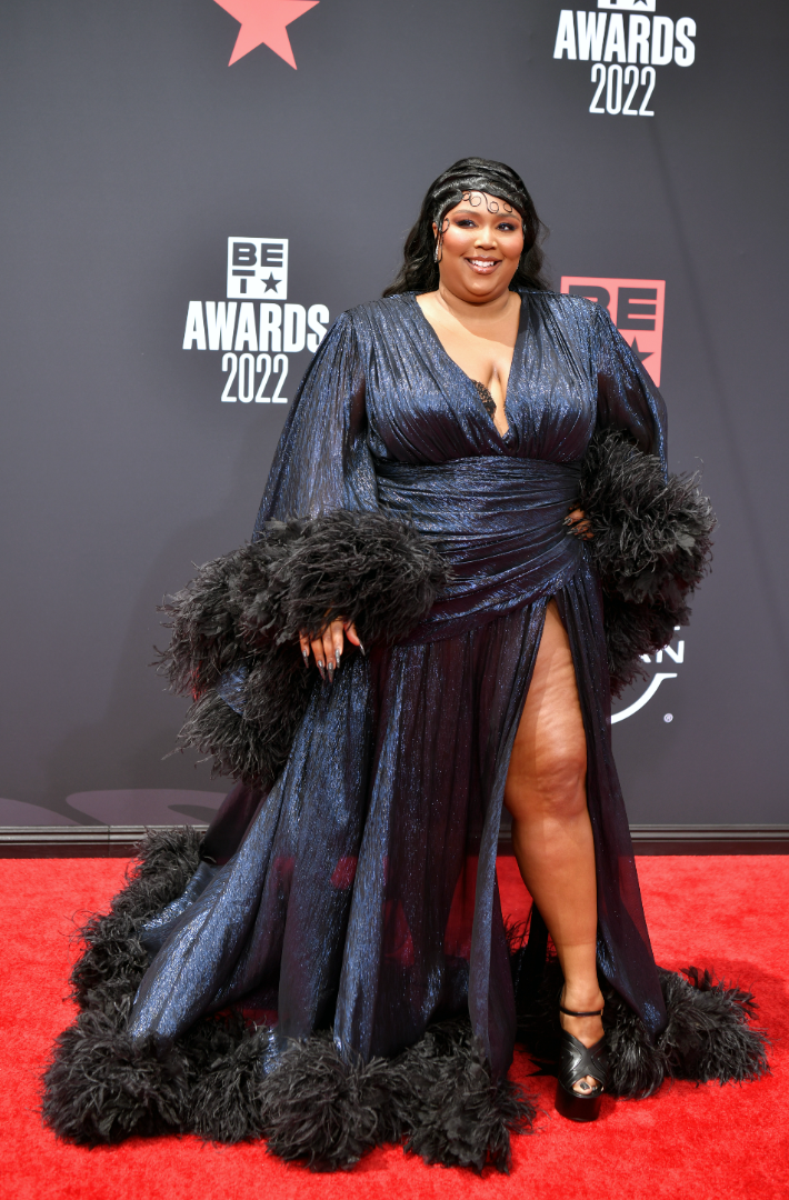 Lizzo’s 2022 B.E.T. Awards Red Carpet Look Says Summer Feathers Are In