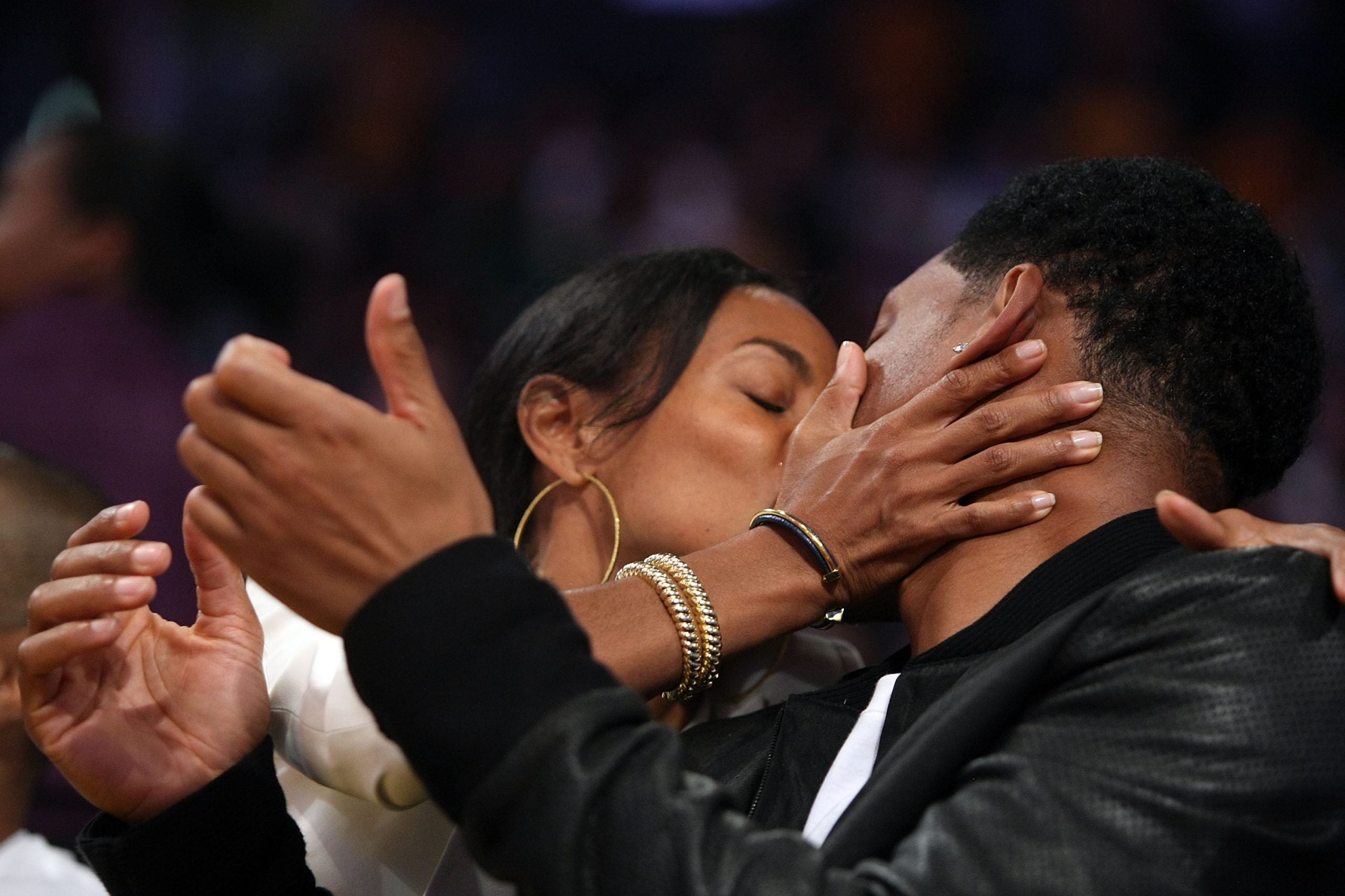 15 Photos Of Will & Jada Packing On The PDA